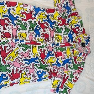 A multi colored button down by Keith Haring